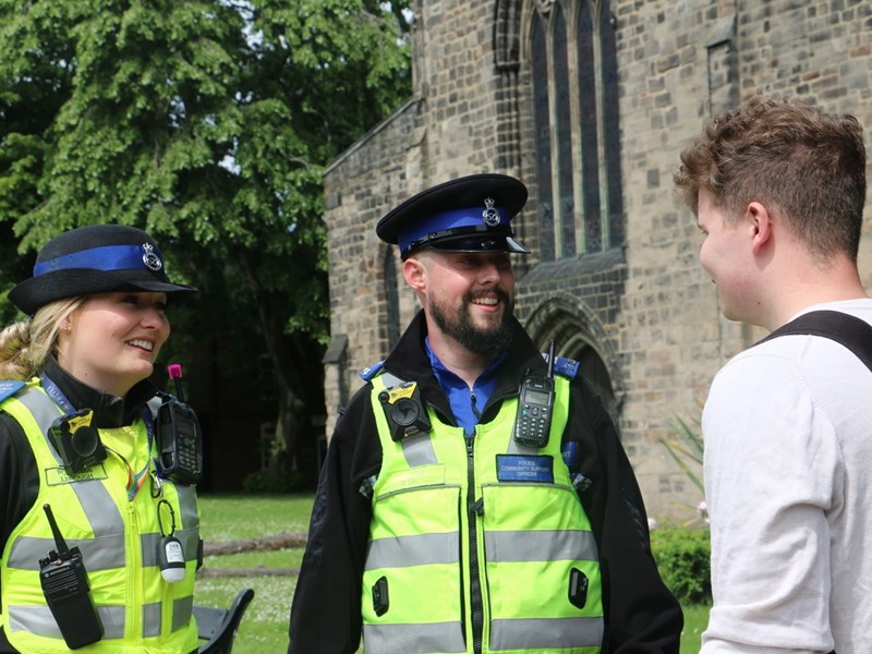 Officers engaging with a member of the public