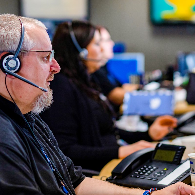 Staff member sat at computer