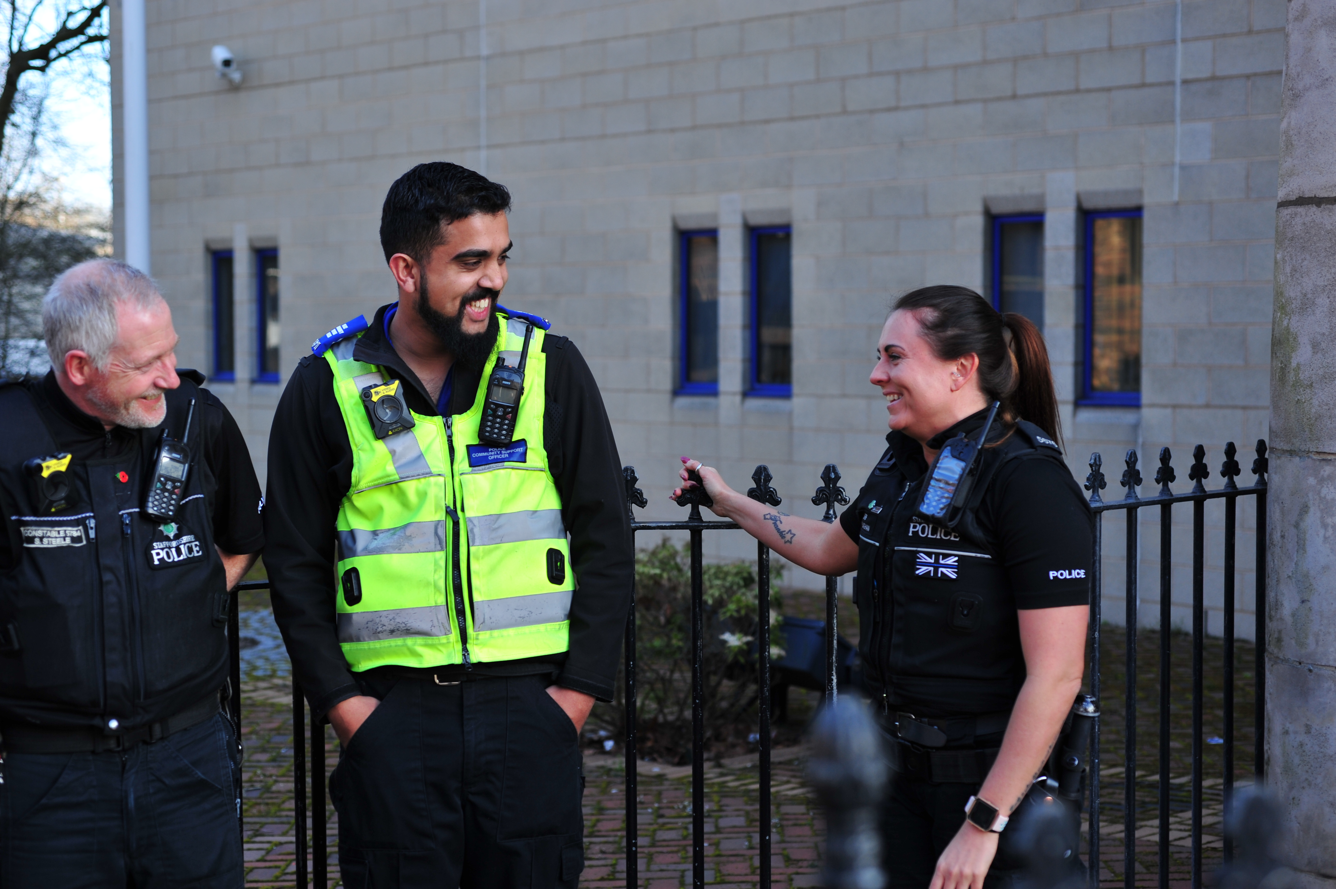 Police officer engaging in roadside assistance