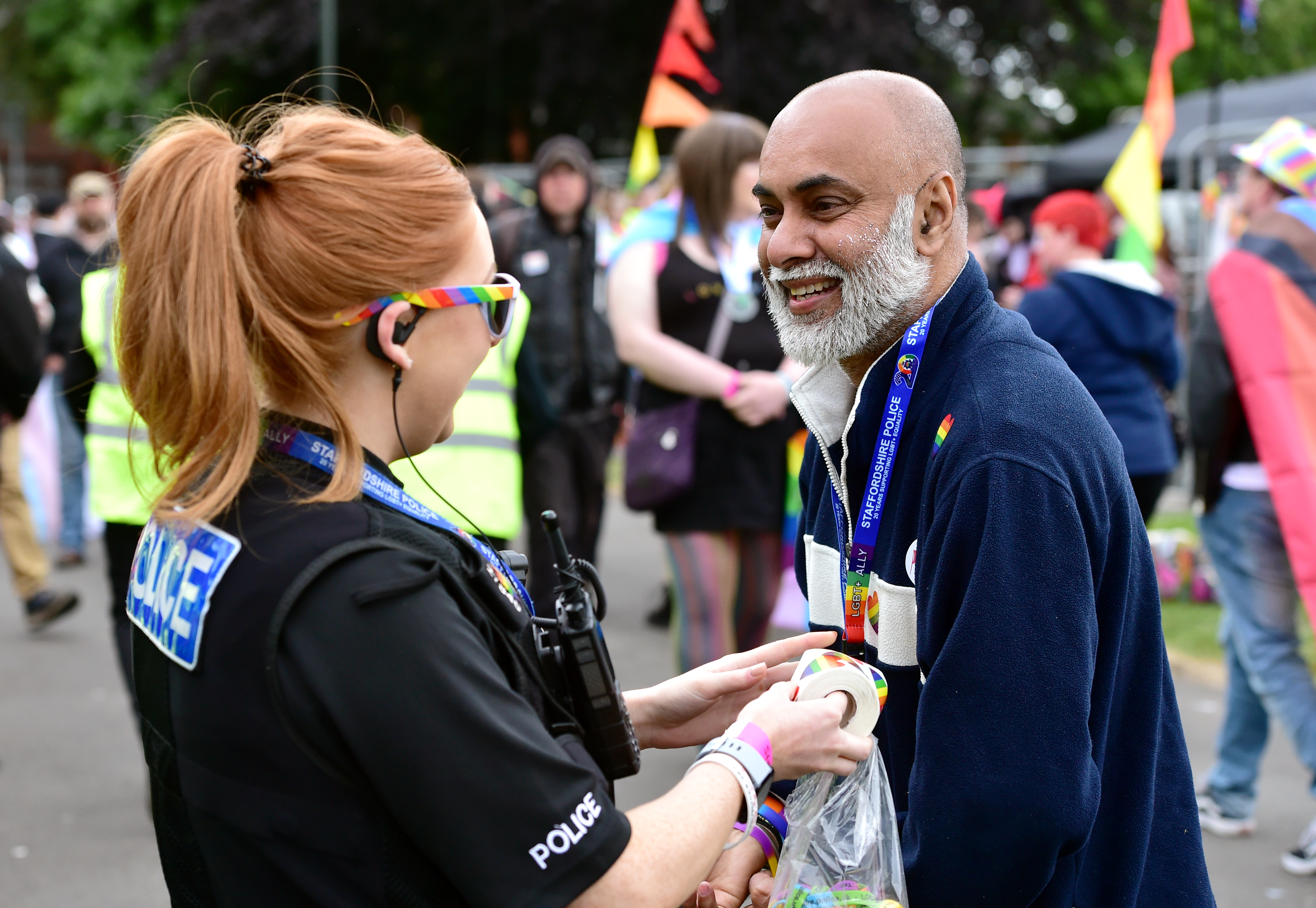 Police officer engaging with a member of the public at Stoke PRIDE event 2022